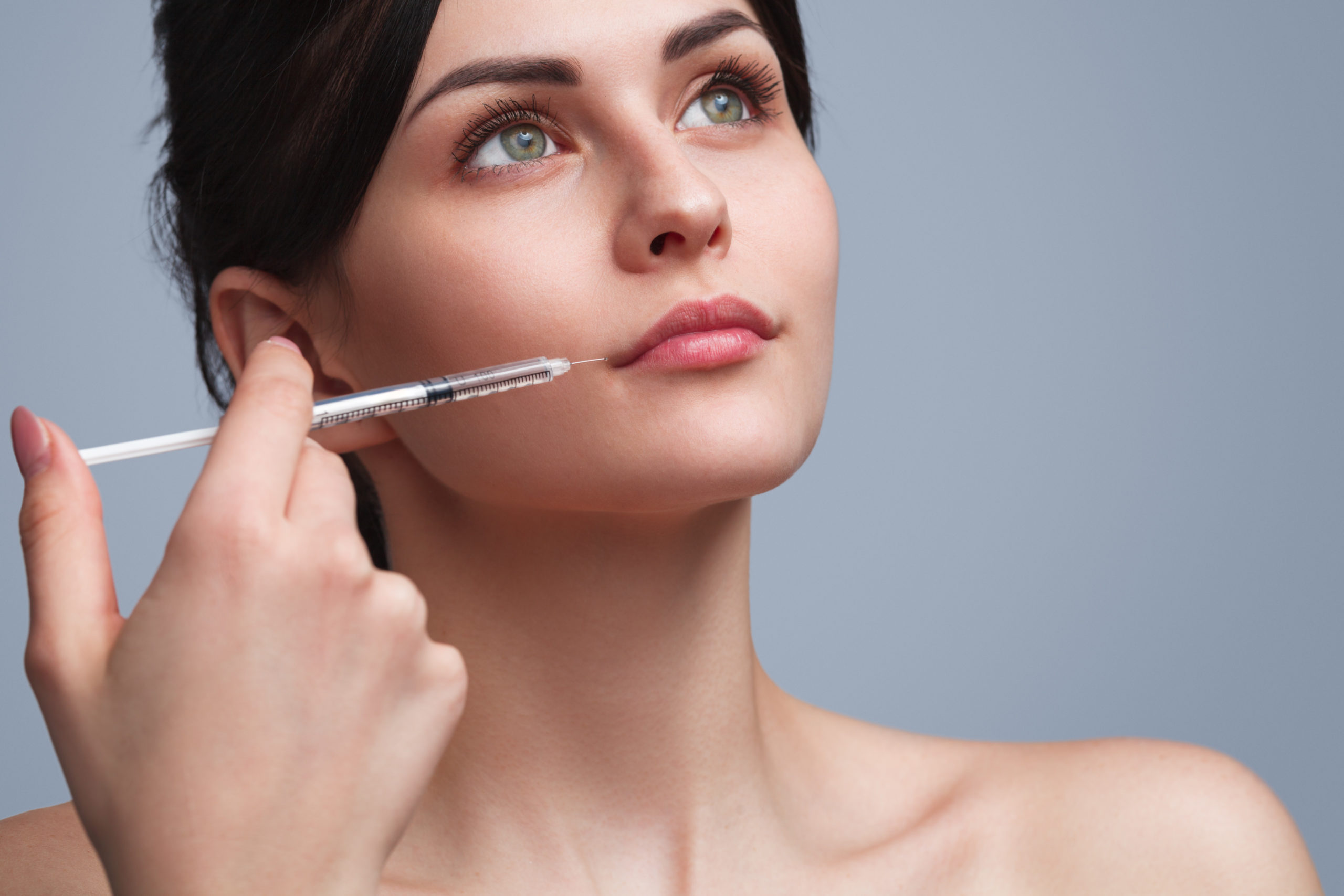 A Lady with dermal filler treatment injection | SOSA Medical Aesthetics in Tampa, FL