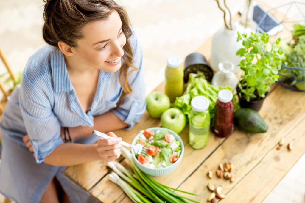 A Beautiful lady eating vegetables | Medical Weight loss in SOSA Medical Aesthetics at Tampa, FL